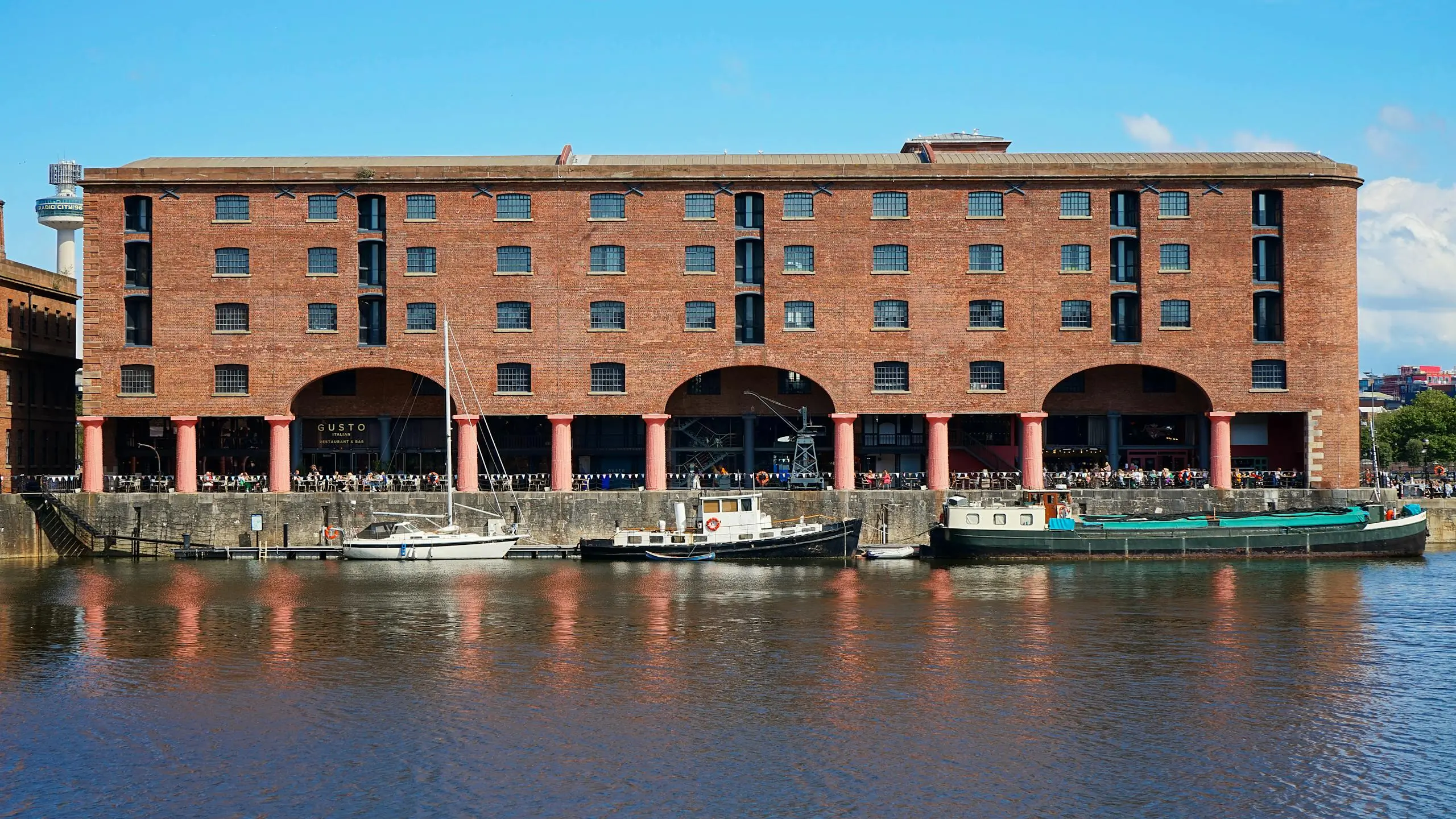 Rank In Liverpool: An Seo Guide To Instagram Spots 5 Vibrant view of Albert Dock in Liverpool, showcasing historical architecture and tranquil waterfront.