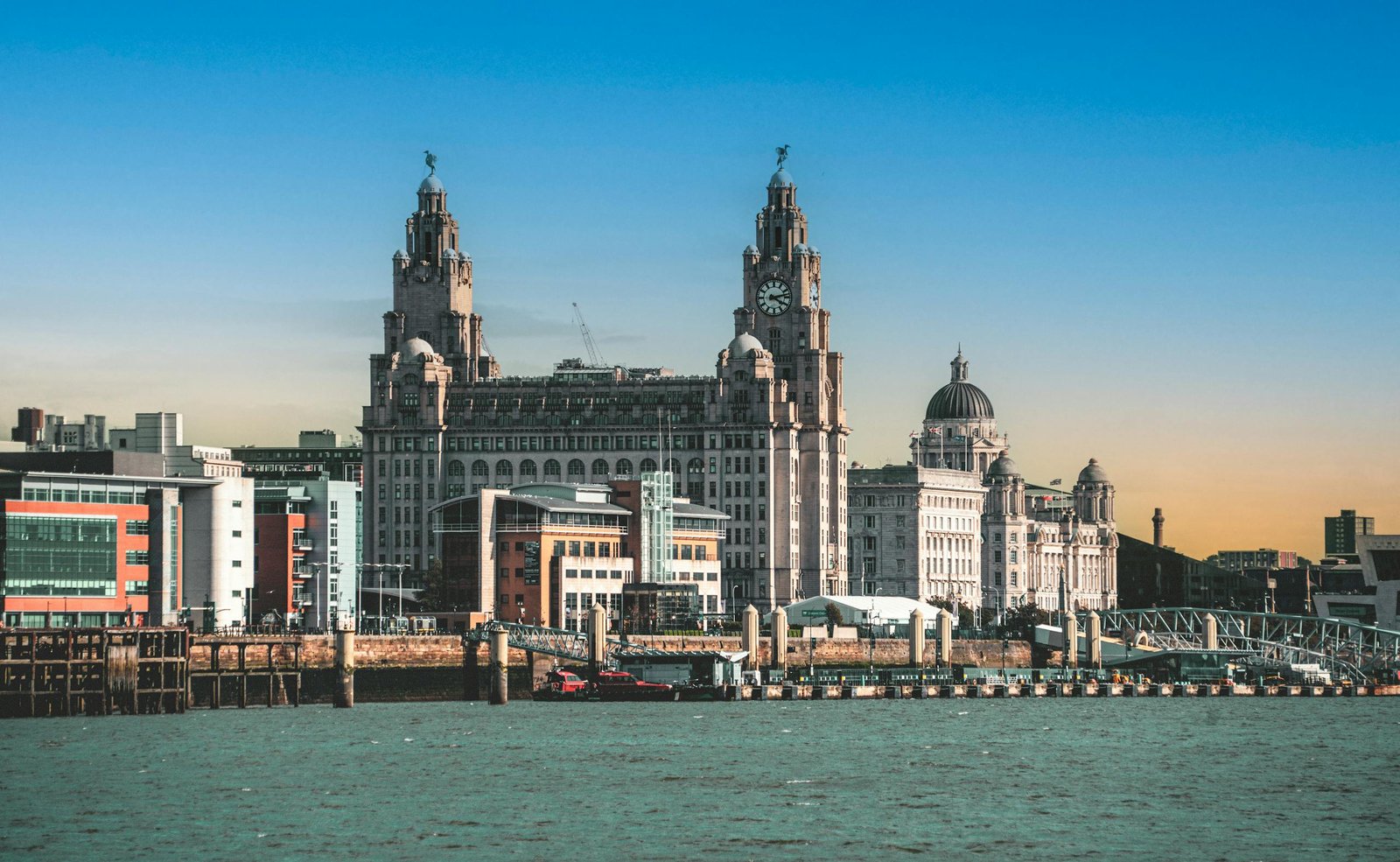 Rank In Liverpool: An Seo Guide To Instagram Spots 6 View of the historic Liver Building and waterfront in Liverpool, England at sunset.